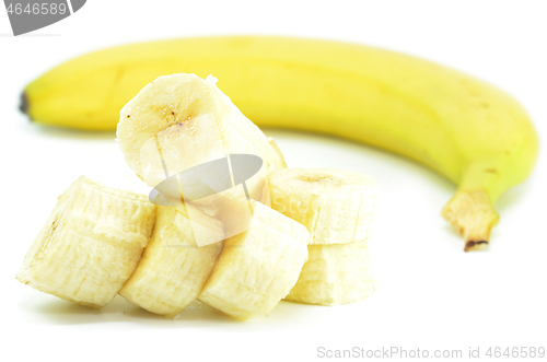 Image of Ripe yellow banana with sliced bananas