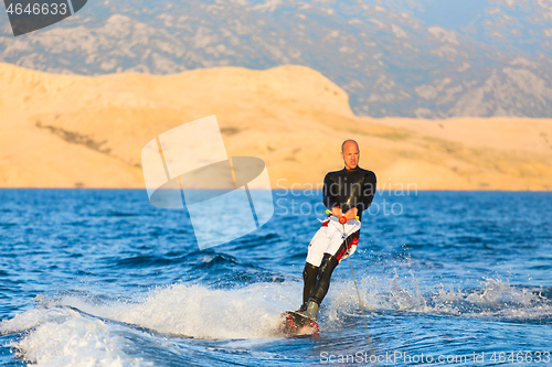 Image of Wakeboarder in sunset.