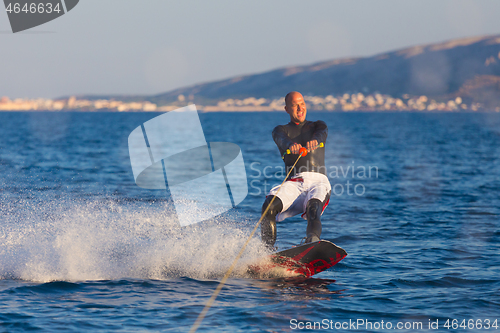 Image of Wakeboarder in sunset.