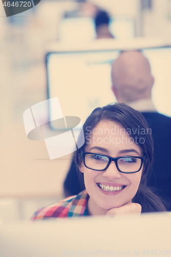 Image of startup business, woman  working on desktop computer