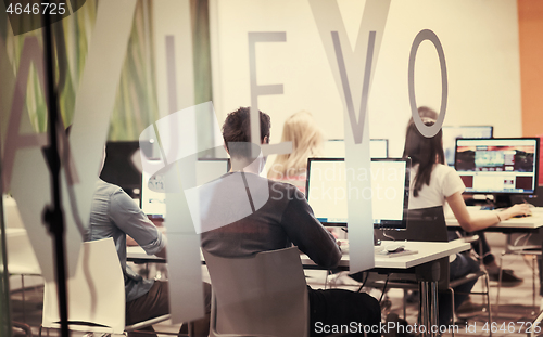 Image of technology students group working  in computer lab school  class