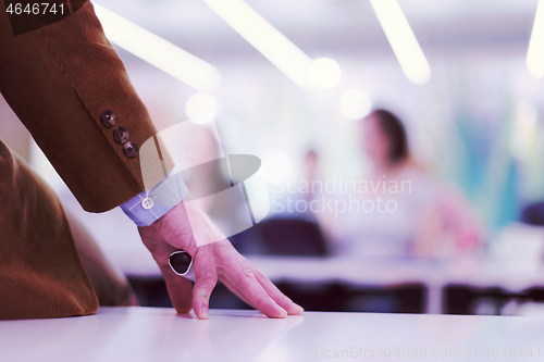 Image of close up of teacher hand while teaching in classroom