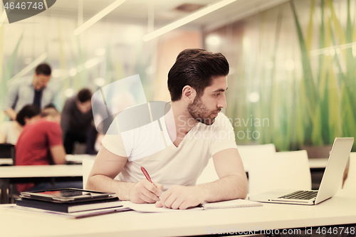 Image of male student in classroom