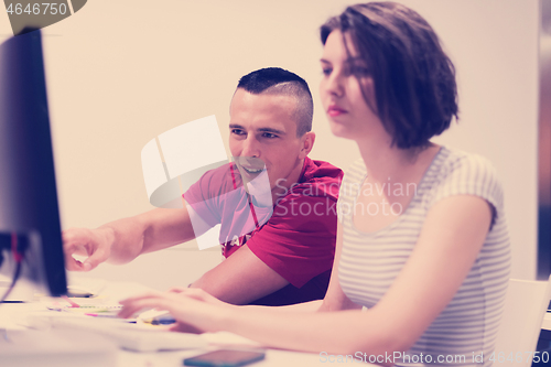 Image of technology students group working  in computer lab school  class