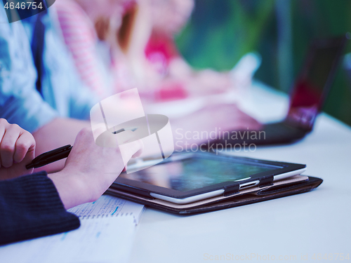 Image of group of students study together in classroom