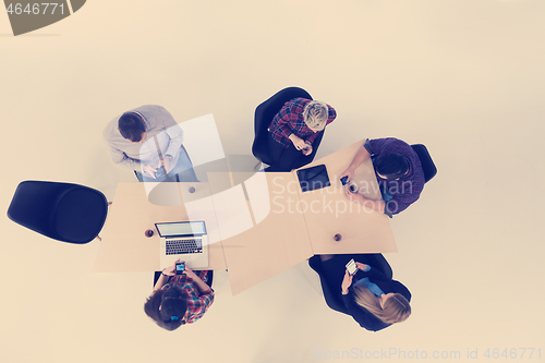 Image of aerial view of business people group on meeting