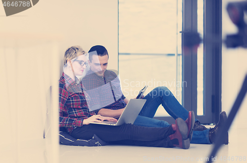 Image of startup business, couple working on laptop computer at office