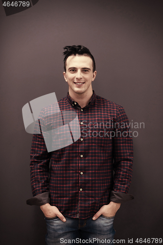 Image of portrait of young startup business man in plaid shirt