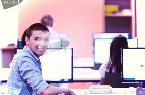 Image of technology students group in computer lab school  classroom