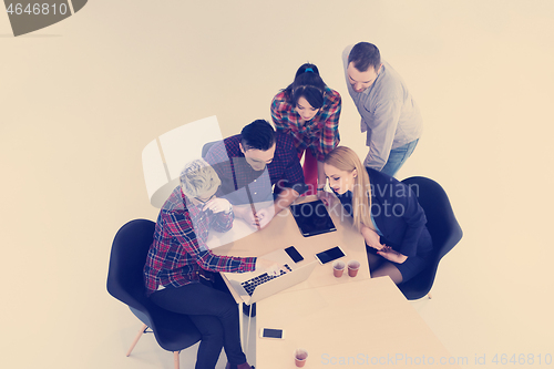 Image of aerial view of business people group on meeting