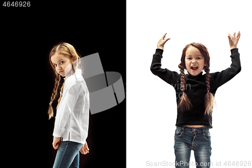 Image of portrait of two emotional girls on a white and black background