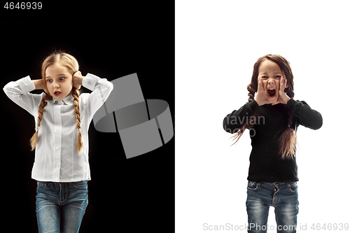 Image of portrait of two emotional girls on a white and black background