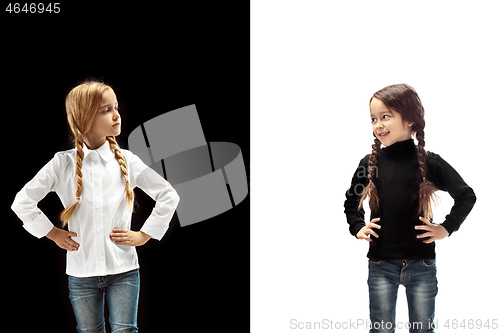 Image of portrait of two emotional girls on a white and black background