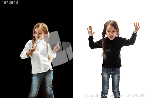 Image of portrait of two emotional girls on a white and black background