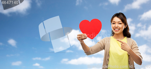 Image of happy asian woman with red heart