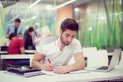 Image of male student in classroom