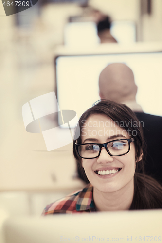 Image of startup business, woman  working on desktop computer