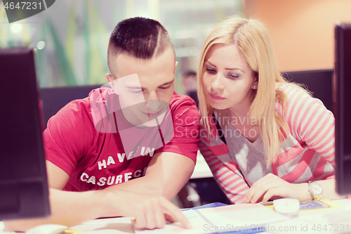 Image of technology students group working  in computer lab school  class