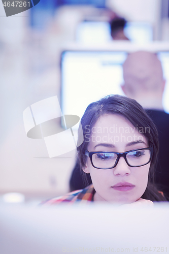 Image of startup business, woman  working on desktop computer