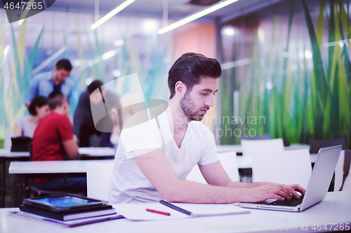 Image of male student in classroom