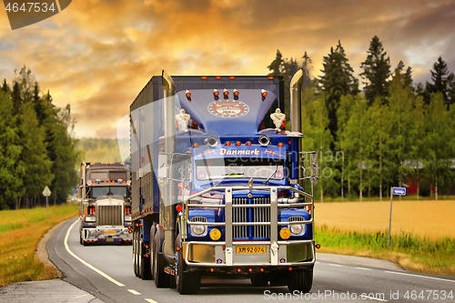 Image of Tuned Semi Trucks at Sunset