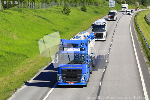 Image of Freight Trucks on Freeway