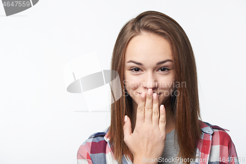 Image of Closeup of happy smiling teen girl looking at camera