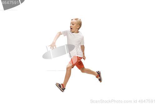 Image of Happy little caucasian boy jumping and running isolated on white background