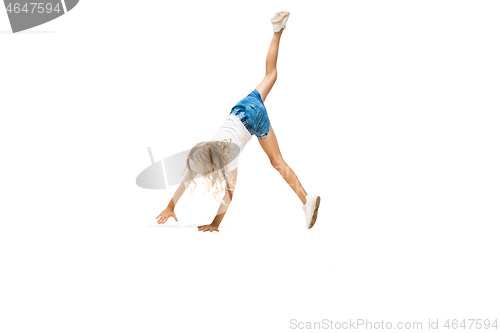 Image of Happy little caucasian girl jumping and running isolated on white background