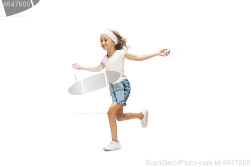 Image of Happy little caucasian girl jumping and running isolated on white background