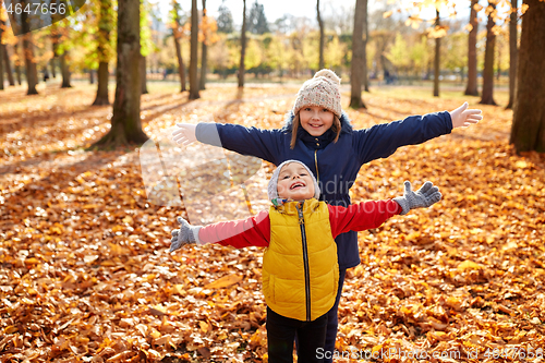 Image of happy children at autumn park