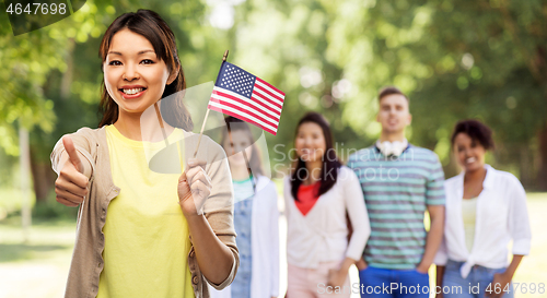 Image of happy asian woman with american flag