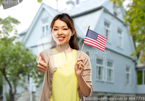 Image of happy asian woman with american flag