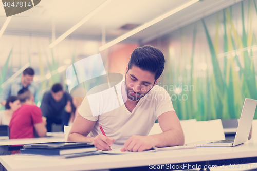 Image of male student in classroom