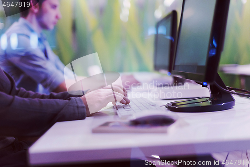 Image of technology students group working  in computer lab school  class