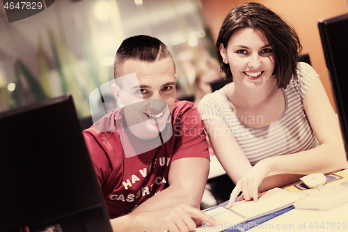 Image of technology students group working  in computer lab school  class