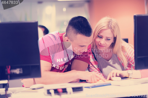 Image of technology students group working  in computer lab school  class