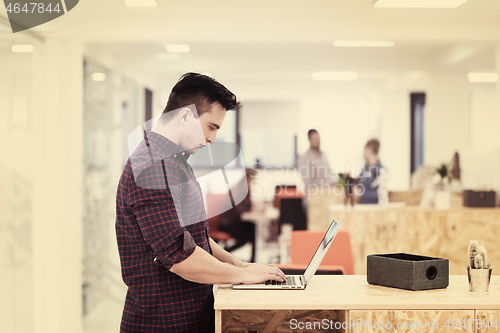 Image of startup business, young  man portrait at modern office