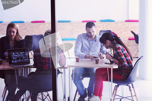 Image of startup business team on meeting at modern office