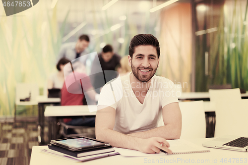 Image of male student in classroom