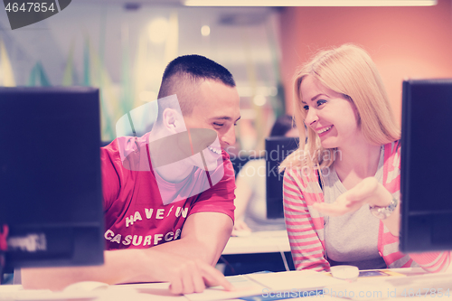 Image of technology students group working  in computer lab school  class