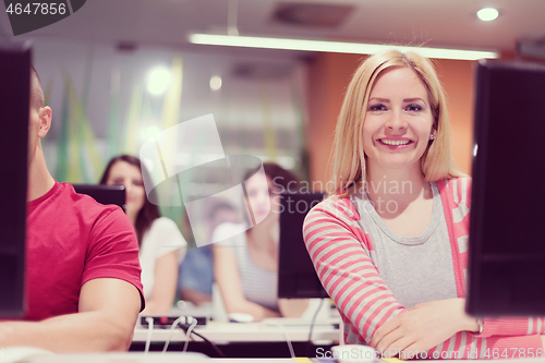 Image of technology students group working  in computer lab school  class