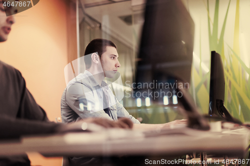 Image of technology students group working  in computer lab school  class