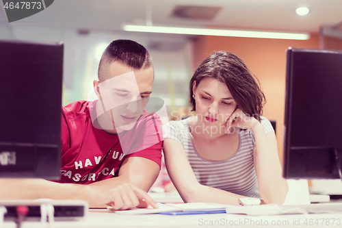 Image of technology students group working  in computer lab school  class