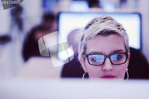 Image of startup business, woman  working on desktop computer