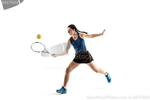 Image of Full length portrait of young woman playing tennis isolated on white background