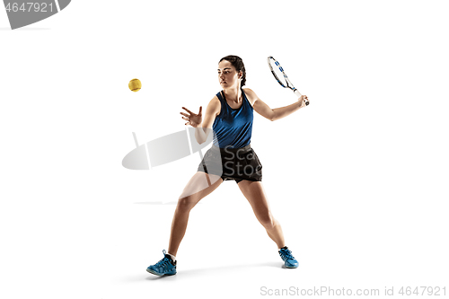 Image of Full length portrait of young woman playing tennis isolated on white background