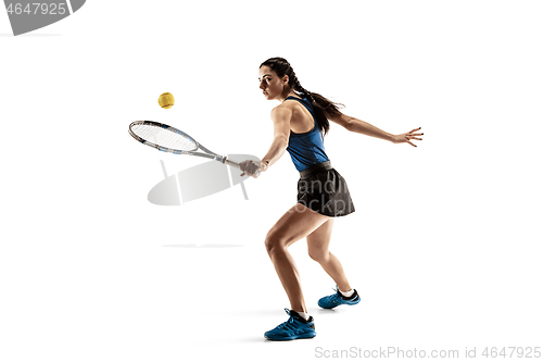 Image of Full length portrait of young woman playing tennis isolated on white background