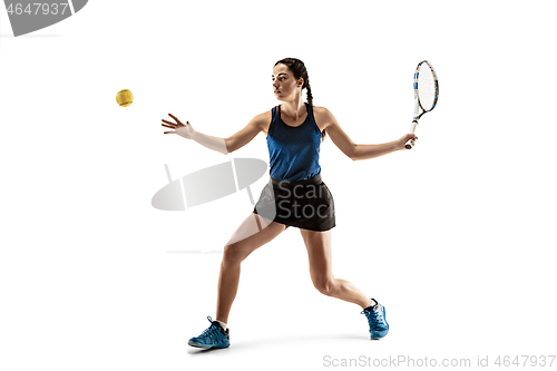 Image of Full length portrait of young woman playing tennis isolated on white background