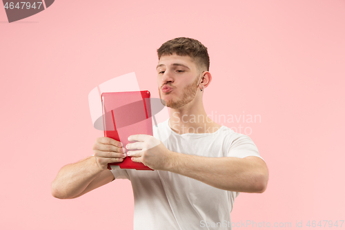 Image of Businessman hugging laptop